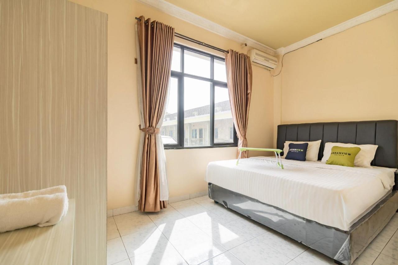 Urbanview Hotel Nugraha Palembang By Reddoorz Exterior photo