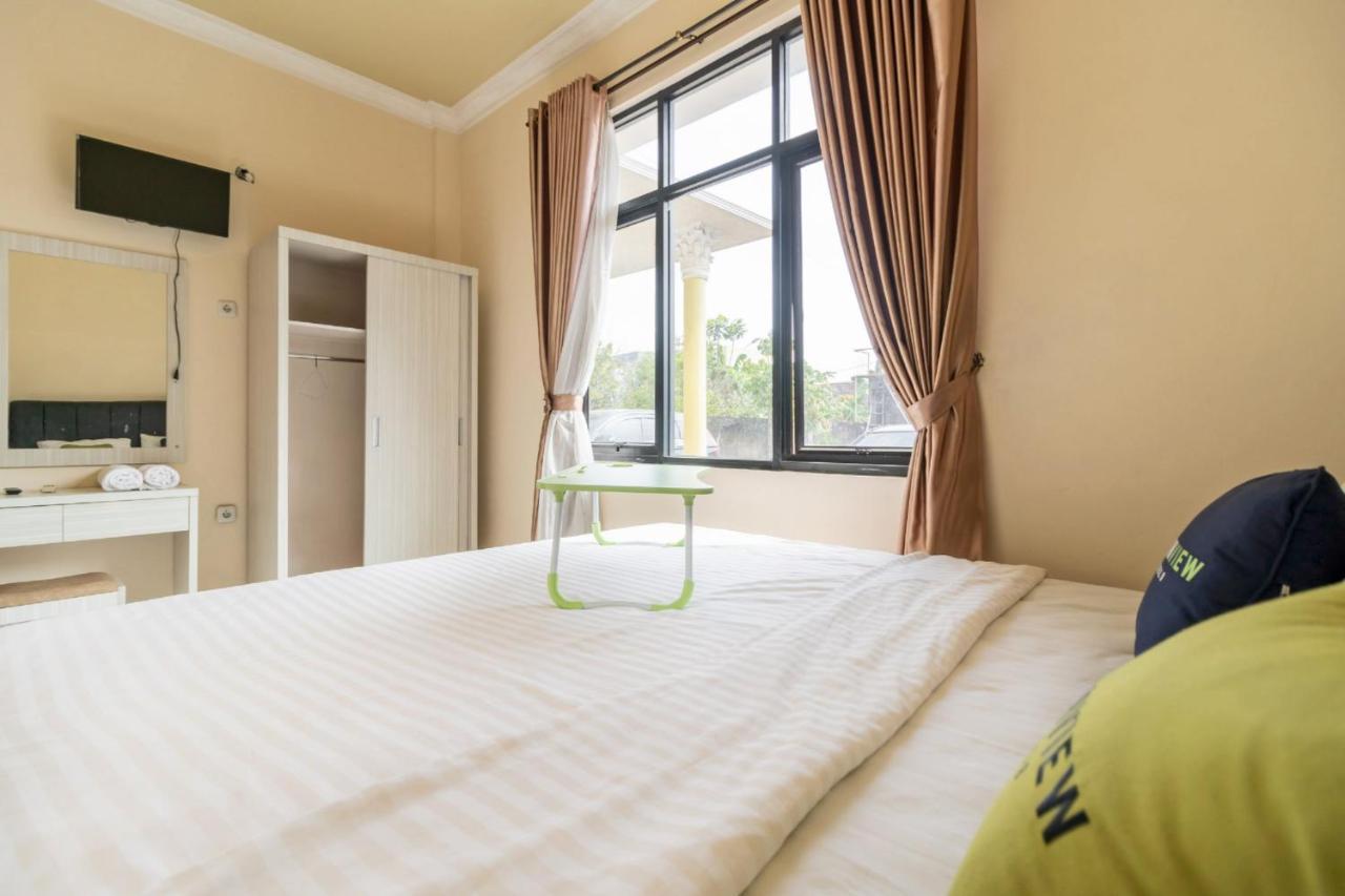 Urbanview Hotel Nugraha Palembang By Reddoorz Exterior photo